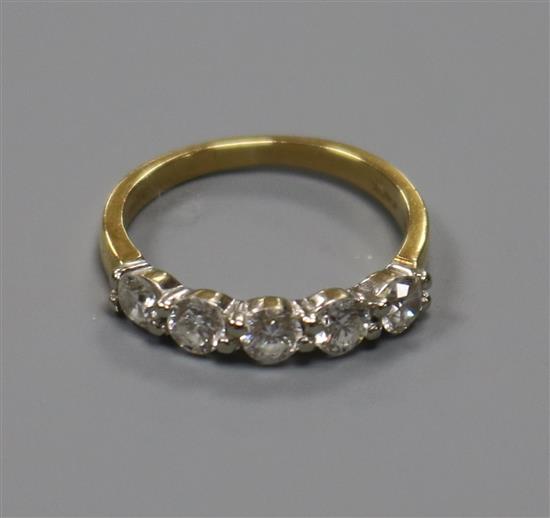 A modern 18ct gold and five stone diamond half hoop ring, size J.